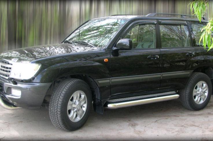 Пороги и боковые трубы на Lexus LX470 фото 1