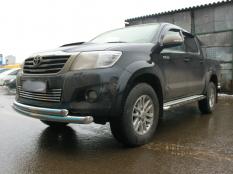 Пороги и боковые трубы на Toyota Hilux фото 7